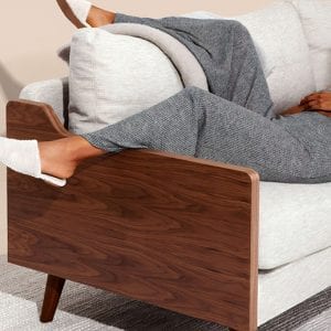 person resting on couch